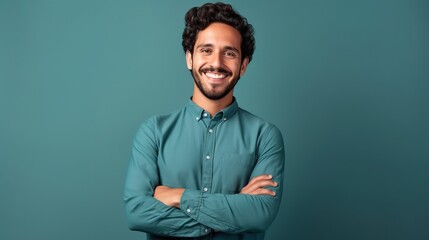 Confident businessman with short dark hair smiles in a casual headshot portrait