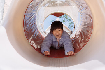 kids playing at outdoor playground