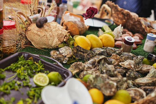 Moroccan seafood: oysters, lemons, sauces, crab