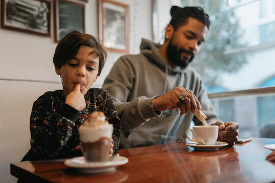 Father and son in a coffeeshop