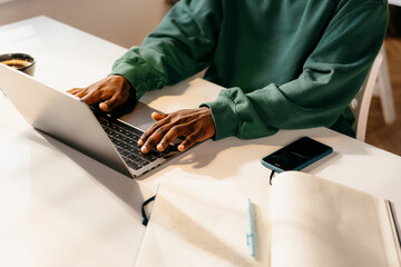 Men hands on laptop keyboard