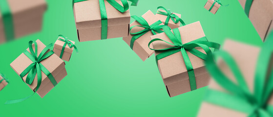 Christmas gift boxes with green ribbon falling or flying in air on green background. shopping Banner