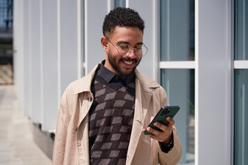 Focused Businessman Surfing Smartphone