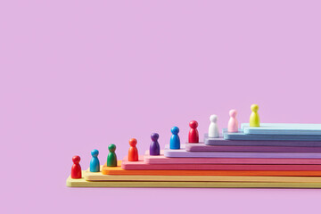 Colorful game chips on rainbow-colored wooden panels.