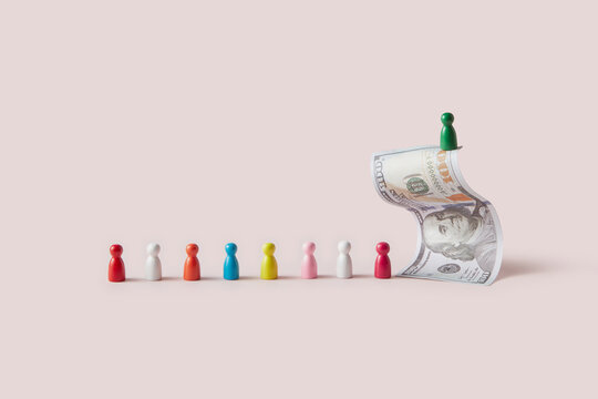 Dollar with game chips of various colors in a row.