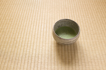 Japanese matcha tea cup on tatami mat