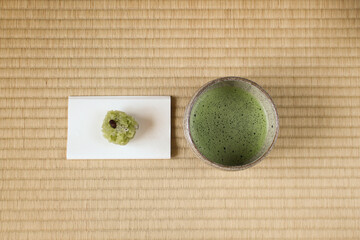 Matcha tea cup and a sweet for Japanese tea ceremony