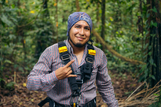 Man with tree climbing equipment