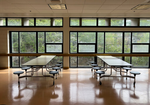 High School Cafeteria interior with table and window light 