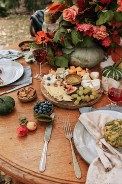 Fall seson brunch in autumn garden.