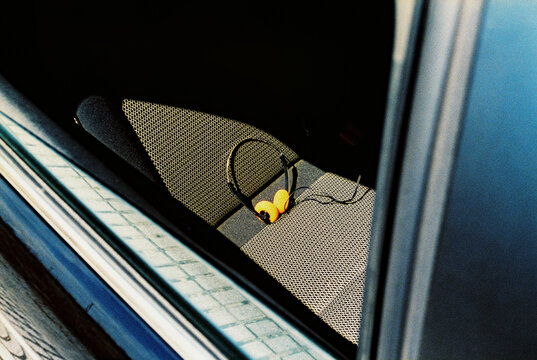 headphones on the back seat of a car, 35mm film