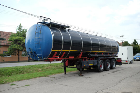 Tanker behind the road