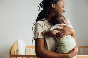 Woman Holding Her Newborn Baby Boy