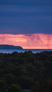 Sunset  with dark  clouds and rain.