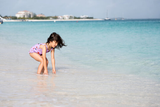 Little kid playing in the water