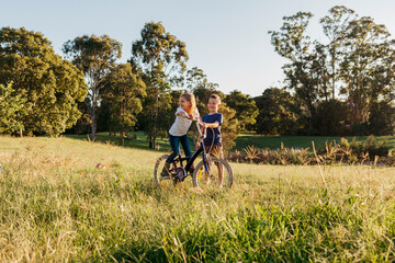 kids with bike playing the a park