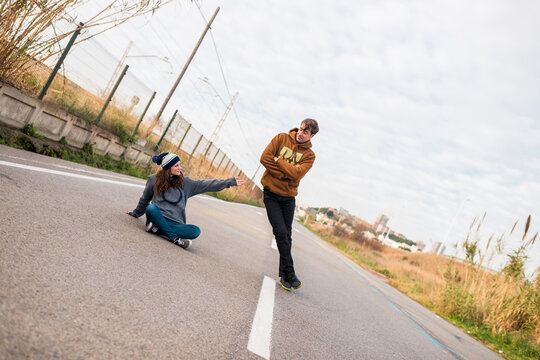 Surreal couple portrait falling down