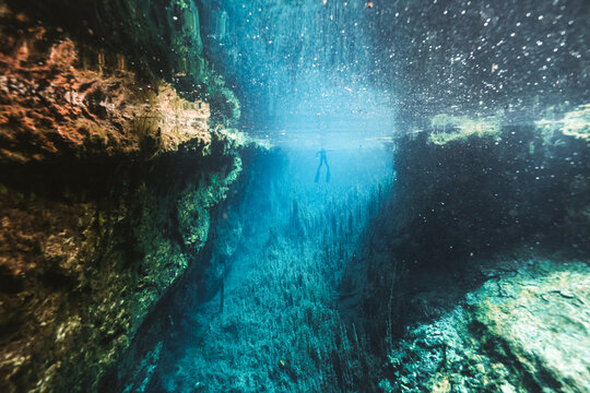 diver in creepy cave