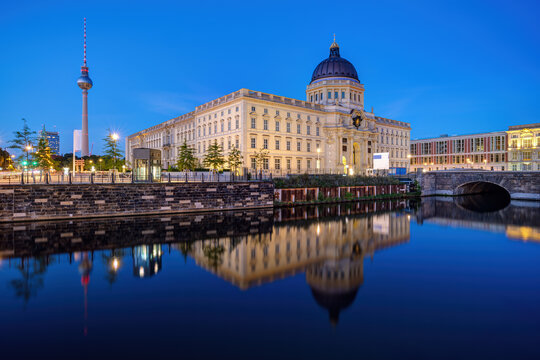 High resolution imgae of the rebuilt Berlin City Palace and the famous TV Tower at night