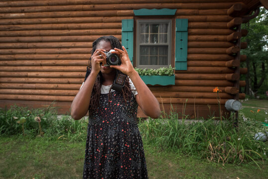 Teenager girl taking photos