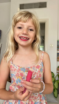 A girl with a lipstick