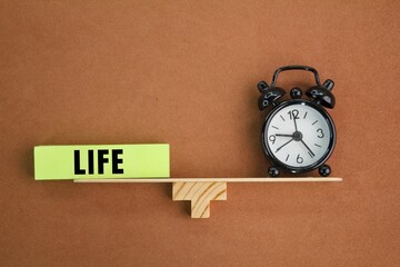 the balance between time and life is balanced. the concept of keeping time in life
