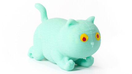 Colorful rubber toy cat isolated on white background.