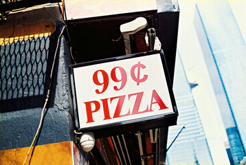 99 cents pizza sign in New York, 35 mm