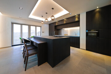 A luxury villa or luxury resort has a face-to-face kitchen as an interior
