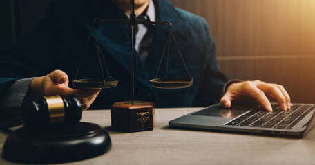 Business and lawyers discussing contract papers with brass scale on desk in office. Law, legal...