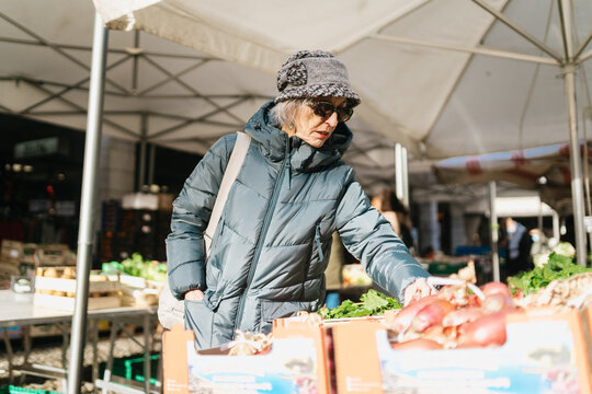 Woman Shopping in Vegetable Market