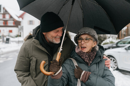 Snowy Day Walk Under Umbrella