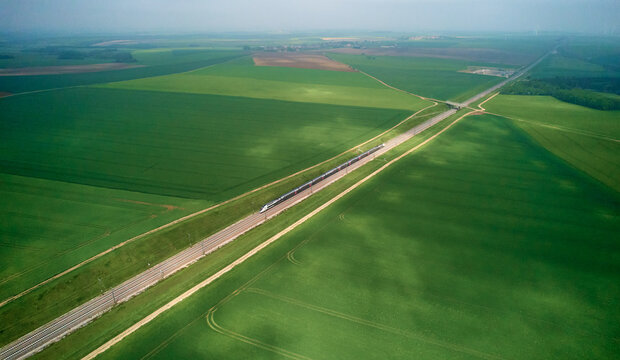 SNCF TGV VFT very fast train speeds 300kmph in France, Europe - aerial