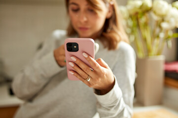 Mobile phone in woman's hand