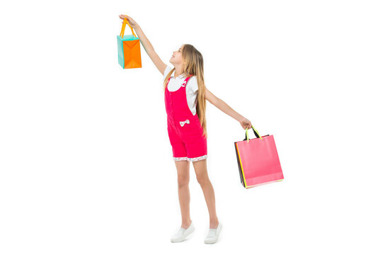 image of teen girl at shopping sale. teen girl at shopping sale isolated on white.