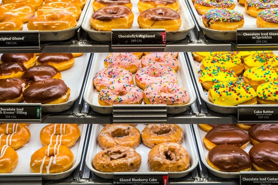 Various delicious doughnuts in trays