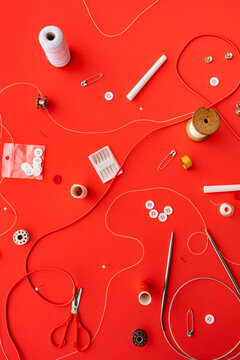 Tailor equipment, buttons and threads.