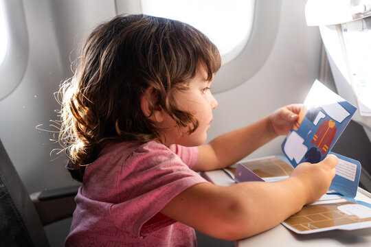 Kid traveling on the plane