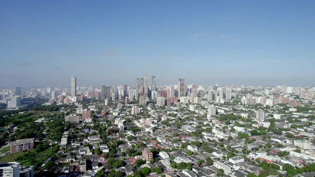 Gazing from above, an aerial view of Barranquilla unveils its urban Skyline, capturing the city's dynamic architecture and bustling life.
