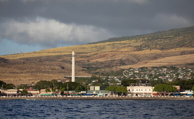 View of the restaurants and shops and Pioneer Mill Smokestack on the Lahaina waterfront and Front...