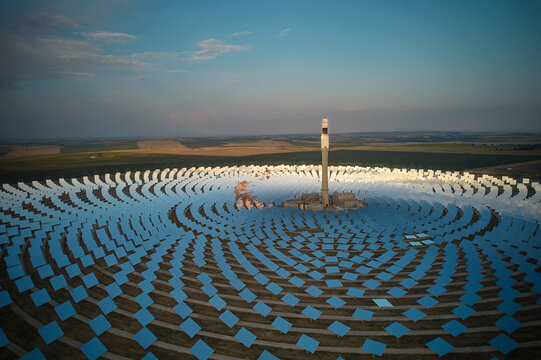 Concentrated solar power plant at dusk - clean green energy transition