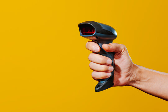 man with a barcode scanner in his hand