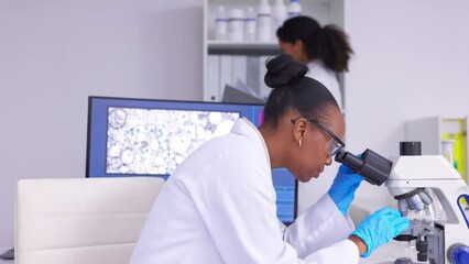 Scientist, black woman and microscope, check data and medical research, investigation and knowledge. Doctor, scientific experiment and future with technology, analysis and science study in lab