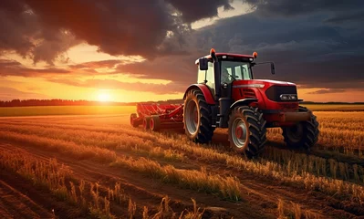 Foto op Plexiglas tractor is driving through a field © alexxndr