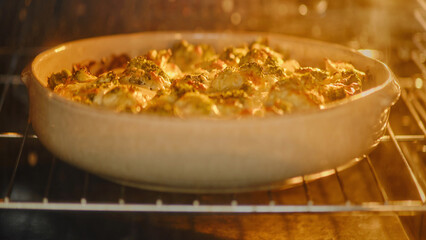 Baking fish with broccoli under cheese in the oven