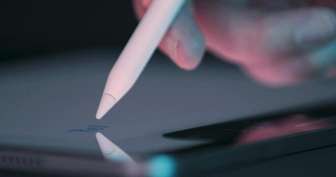 Close-up of digital note written with stylus on tablet screen