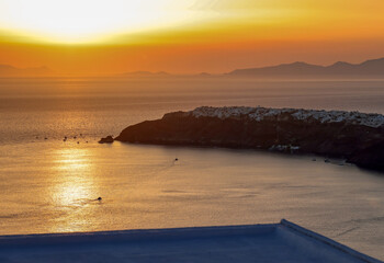 Fototapeta premium Sunset over Santorini as seen from Imerovigli. Cyclades, Greece