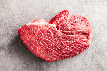 Raw fillet steak beef meat on kitchen table. Top view.
