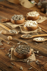 DRİED NUTS AND FRUİTS IN WOODEN BOWL ON BROWN FLOOR