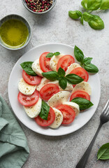 Caprese salad with tomatoes, mozzarella and basil.
